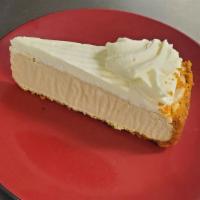 Apple Caramel Cheesecake · Graham cracker crust baked with caramel cheesecake topped with apple cubes and finished with...