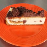 Caramel Brownie Cheesecake · Fudgy brownies and creamy cheesecake deliciously conspire to deliver a classic Americana mas...