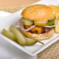 Organic Michigan Whopper · 1/4 lb. grilled Michigan grass-fed beef with melted cheddar cheese, lettuce, onion, pickles,...