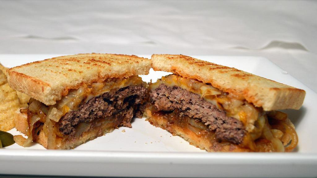 The Michigan Melt · Caramelized onion & cheese, Beyond
Meat or Michigan grass-fed beef on
sourdough bread