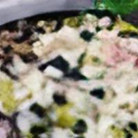 Antipasto Salad · Lettuce, Tomatoes, Onions, Green Peppers, Black Olives, Mozzarella, Pepperoncini, Ham & Sala...