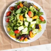 Signature House Salad · (Vegetarian) Romaine lettuce, cherry tomatoes, carrots, and onions dressed tossed with lemon...