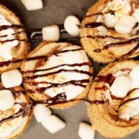 Smore'S Bites · Graham Cracker Chimney Cake with Milk chocolate Filling, toasted Marshmallow Fluff and a Cho...