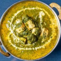 Palak Panner · Cottage cheese and spinach cooked in authentic gravy