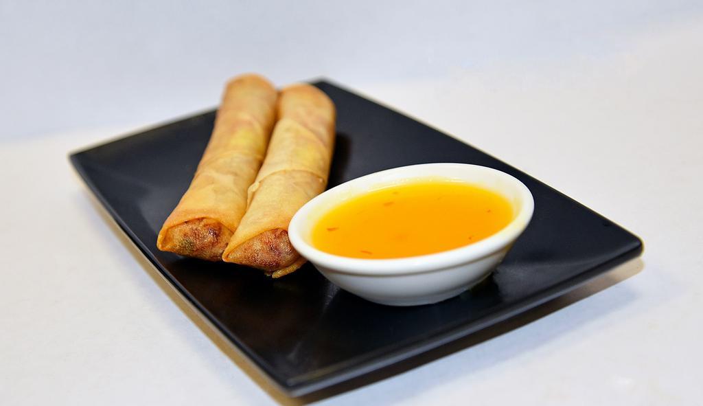 Spring Rolls (2) · Cabbage, celery, carrot, and bean thread noodle wrapped in spring roll wrapper. Served with plum sauce.