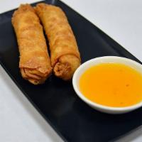 Egg Rolls (2) · Pork, egg, cabbage, carrot, celery, and onion wrapped with egg roll wrappers. Served with pl...