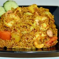 Curry Fried Rice One Size · Yellow curry. Fried rice with egg, onion, pineapple, tomato, cashew nut in curry powder.