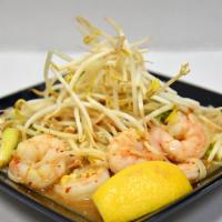 Pad Thai One Size · Rice noodles stir-fried with egg, green onion, bean sprout, topped with lemon, ground peanuts.