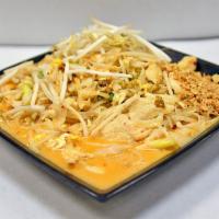 Curry Noodle One Size · Spicy. Rice noodle stir-fried with egg, green onion, bean sprout in red curry sauce topped w...