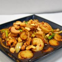 Pad Cashew One Size · Cashews with bamboo shoot, green onion, onion, and water chestnut in brown sauce.