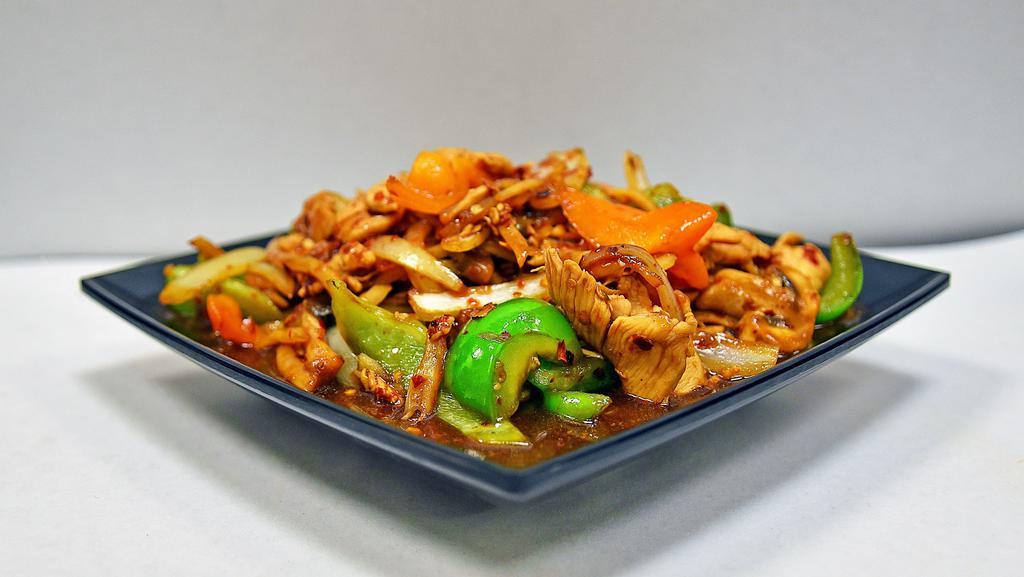 Pad Prik One Size · Spicy. Green onion, onion, bell pepper, bamboo shoot, mushroom, and ground hot chili pepper with brown sauce.