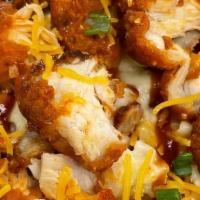 Bbq Buffalo Chicken Mac · A mix of yellow and white mac, a BBQ drizzle, topped with buffalo Chicken and a sprinkled sh...