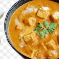Paneer Tikka Masala · Marinated cubed cheese grilled and cooked in delicious creamy sauce.