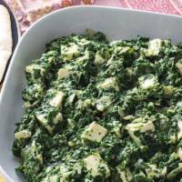Saag Paneer · chopped Spinach and cheese with diced onions & herbs  cooked in rich creamy sauce