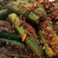 Bhindi Bhaji · Fresh okra cooked with chopped onions, tomatoes, ginger and spices.