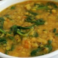Saag Dal · Lentils cooked with spinach and mild curry sauce.