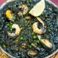 Shrimp Saag · Shrimp cooked with fresh spinach, onion and garlic.