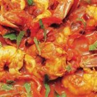 Shrimp Bhuna · Shrimps cooked with ground spices, tomatoes, bell peppers and herbs in a thick curry sauce.