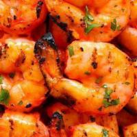 Shrimp Tandoori · Shrimp marinated in herbs and spices, skewered and cooked in clay oven.