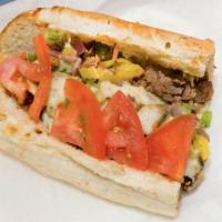 Philly Steak Sub · Steak, red onions, green peppers, pepper rings, mushrooms, tomatoes, and cheese.