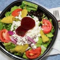Greek · Romaine lettuce, red onions, pepperoncini peppers, feta cheese, beets, kalamata olives, toma...