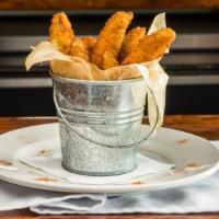 Fried Pickles · Hand-breaded fried pickle spears served with ranch or southwest ranch.