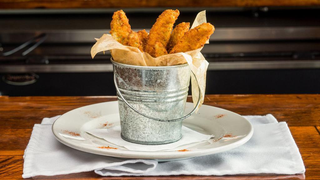 Fried Pickles · Hand-breaded fried pickle spears served with ranch or southwest ranch.