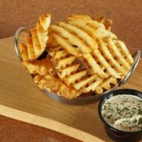 Cajun Ranch Waffle Fries · Waffle cut potatoes fried to a golden crisp then tossed in our special Cajun ranch seasoning...