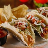 Chipotle Lime Chicken Tacos* · Slow-roasted chicken seasoned with our special chipotle essence and finished with Monterey C...