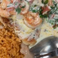 Pollo Jerez · Grilled chicken breast topped with shrimp and Pico de Gallo. Topped with cheese sauce. Serve...