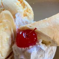 Chango/ Monkey · Cheesecake filling wrapped inside of a large flour tortilla. Served with ice cream.