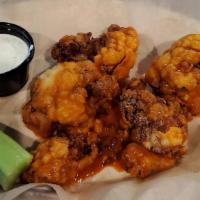 Cauliflower Wings (Try A Third Base Pint House Favourite) · Tossed in buffalo sauce