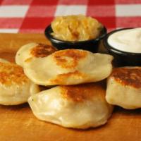 Potato & Cheddar Pierogi · These are the little folds of savory goodness you have been craving. Five classic potatoes a...