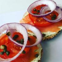 Bagel & Lox · Choice of plain or everything bagel, choice of cream cheese, smoked salmon lox, tomatoes, pi...