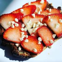 Strawberry Nutella Toast · Local sourdough, Nutella, strawberries, yogurt chips.