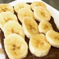 Banana Toast · Local sourdough with choice of peanut butter (vegan), almond butter (vegan) or Nutella, bana...