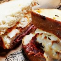 Dinty Moore · Eastern Market’s Famous Grobbel’s Corned Beef, turkey, swiss cheese, coleslaw & house sauce,...