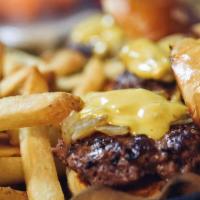 Classic Sliders · Angus burger topped with beer-braised onions, sweet & spicy pickle chips & American cheese, ...