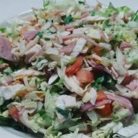 Chef Salad · Sliced ham, smoked turkey, Swiss cheese, American cheese, tomato & red onion tossed with cho...