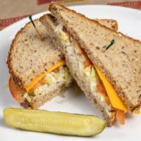 Tuna Sandwich · Albacore tuna, mixed with celery, onions and light mayo, topped with Boar's Head cheddar che...