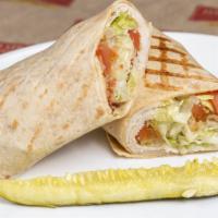 Turkey Club Wrap · Oven roasted turkey breast topped with shredded lettuce, tomato and smoked bacon served with...