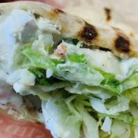 Chicken Caesar Salad Wrap · Chicken breast, fresh romaine, homemade croutons and grated Parmesan cheese. Served with Cae...