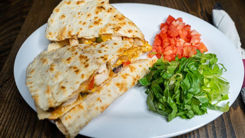 Quesadilla · Your choice of meat: chicken, ground beef - black beans, red peppers, green peppers, mixed cheese, queso cheese.