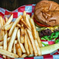 Celina Burger · Our half pound patty seared with Cajun spices and mellowed with white cheddar. Garnished wit...