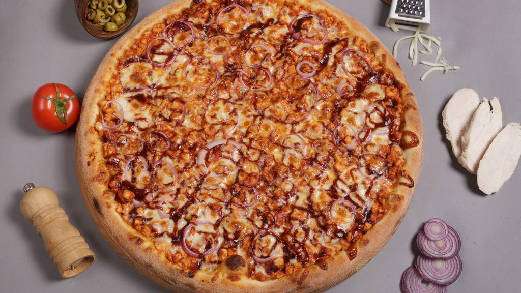 Bbq Chicken Pizza · Features a thin and crispy crust with grilled boneless breast of chicken with onions & BBQ sauce.