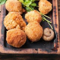 Breaded Mushrooms · Golden fried mushrooms with a perfect crisp.
