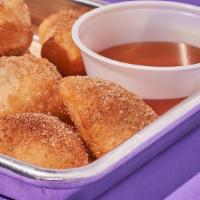 Sopapilla Bites · Cinnamon Sugar dusted over fresh deep fried house made tortilla bites, served with a side of...