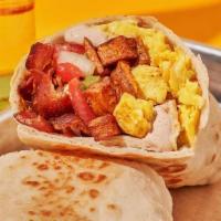Breakfast Burrito · Large flour tortilla, fried potatoes, scrambled eggs, jack cheese, pico de gallo, house crem...