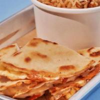 Kid Cheese Quesadilla · Small flour tortilla with melted Jack Cheese.