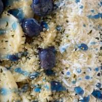Blue Meditation · Base: Almond milk, pear, mango, blue spirulina
Toppings: Banana, blueberries, coconut shavin...